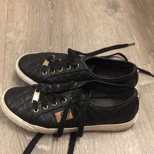 platform black and gold shoes
